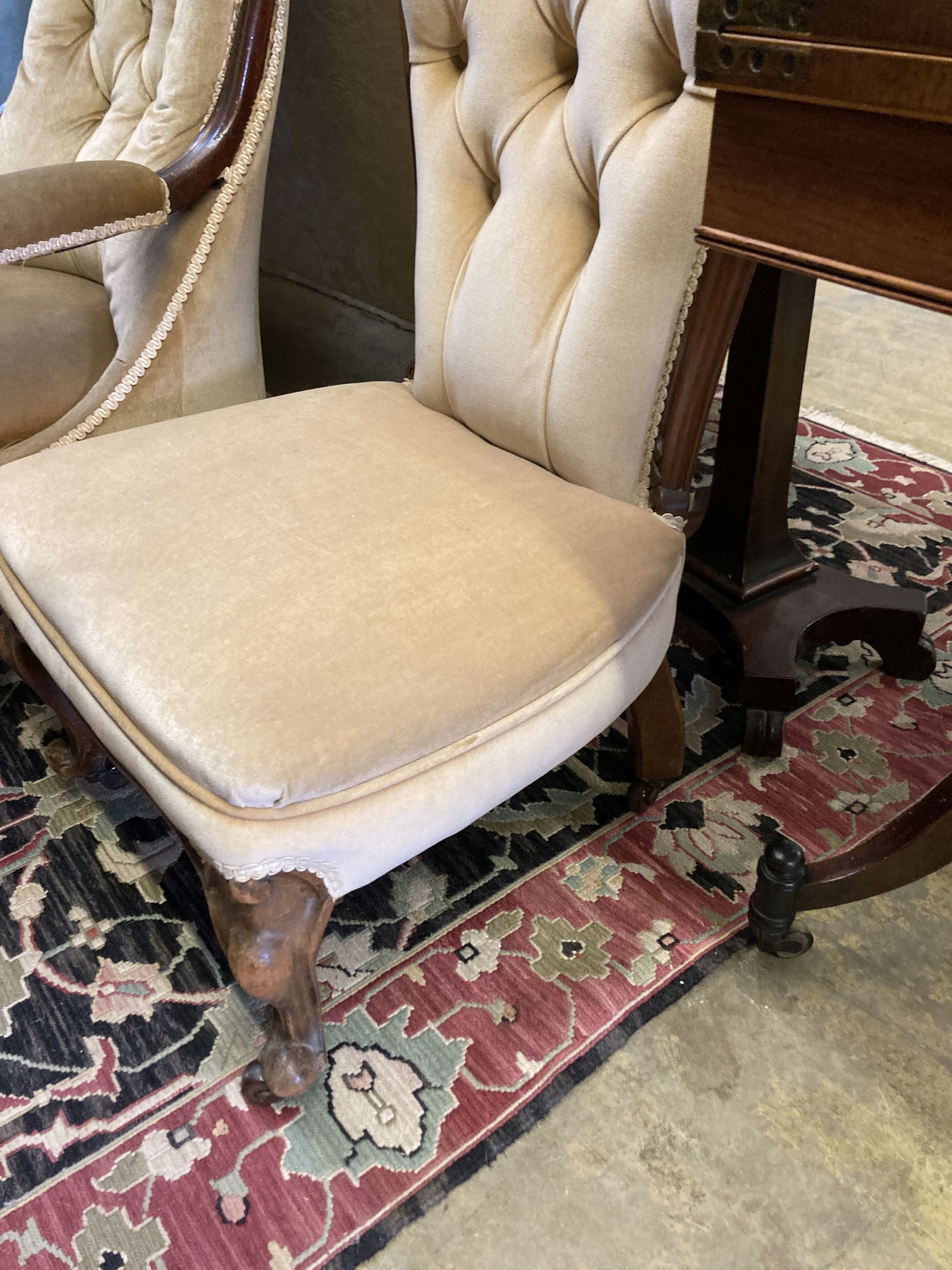 Two Victorian mahogany spoonback chairs (one with arms)